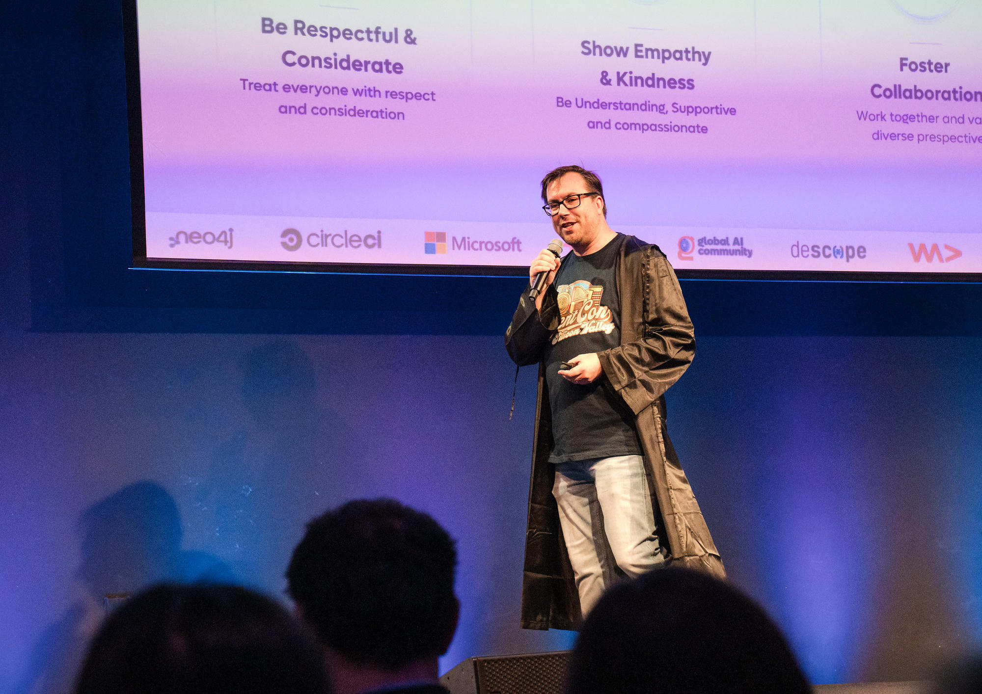 Speaking about respect, empathy, kindness, and collaboration at a community event
