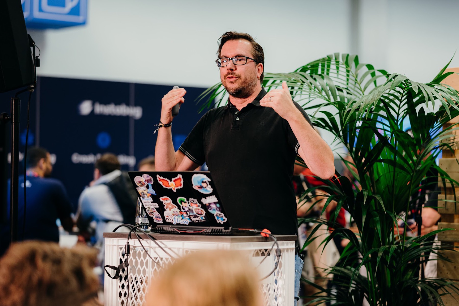 Henk sharing a technical story at a community booth